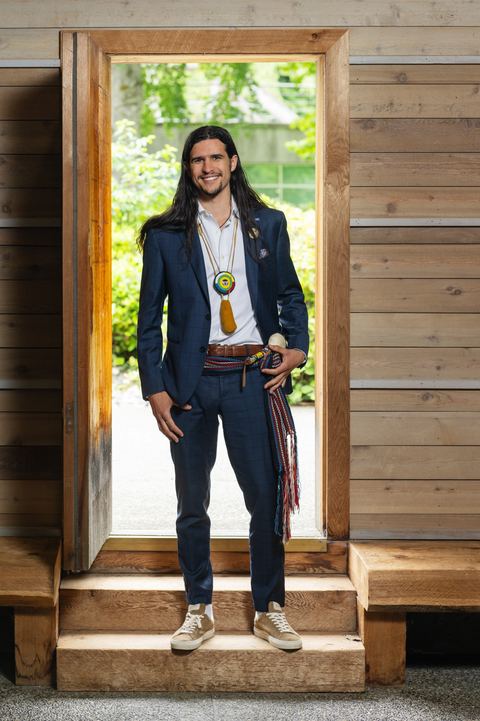 Darren Rea standing in a wooden doorway